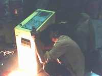 SMX engineer examines panel